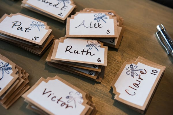Seating chart names written on cards